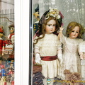 Dolls and costumes in the display window